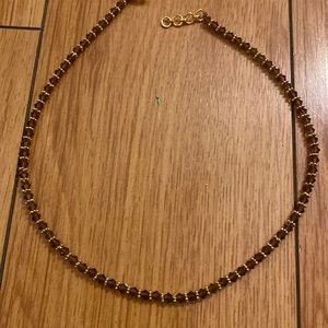 Woman’s all around necklace golden with brown stones